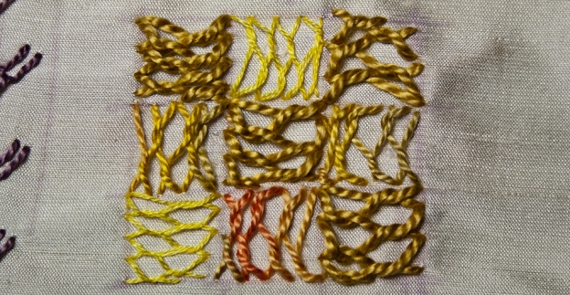 Closed Feather stitch. I don't like the thicker threads here.
